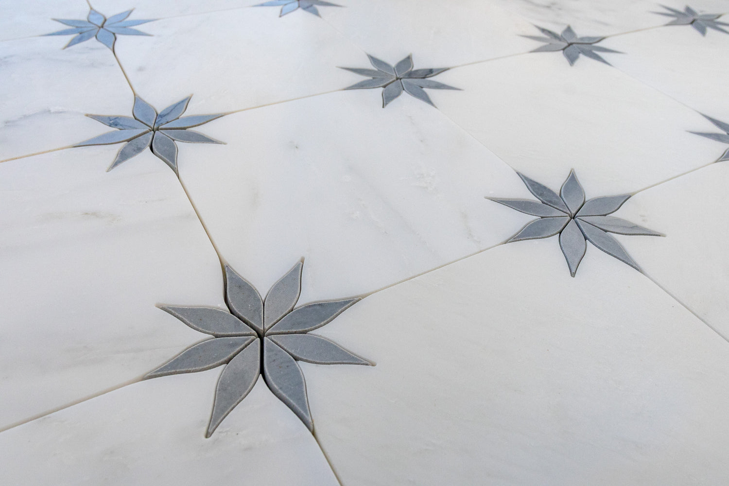 grey floral and white square tile