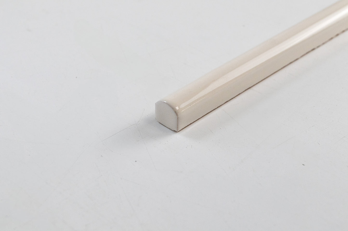 Bridgwood Petite Off White Glossy Liner 0.5" x 12"