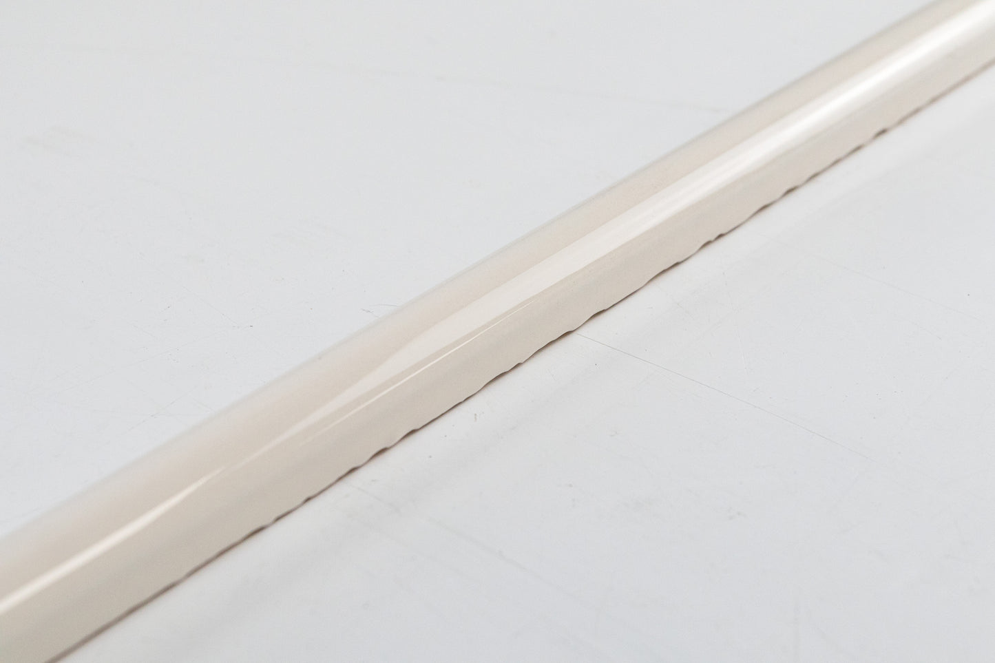 Bridgwood Petite Off White Glossy Liner 0.5" x 12"