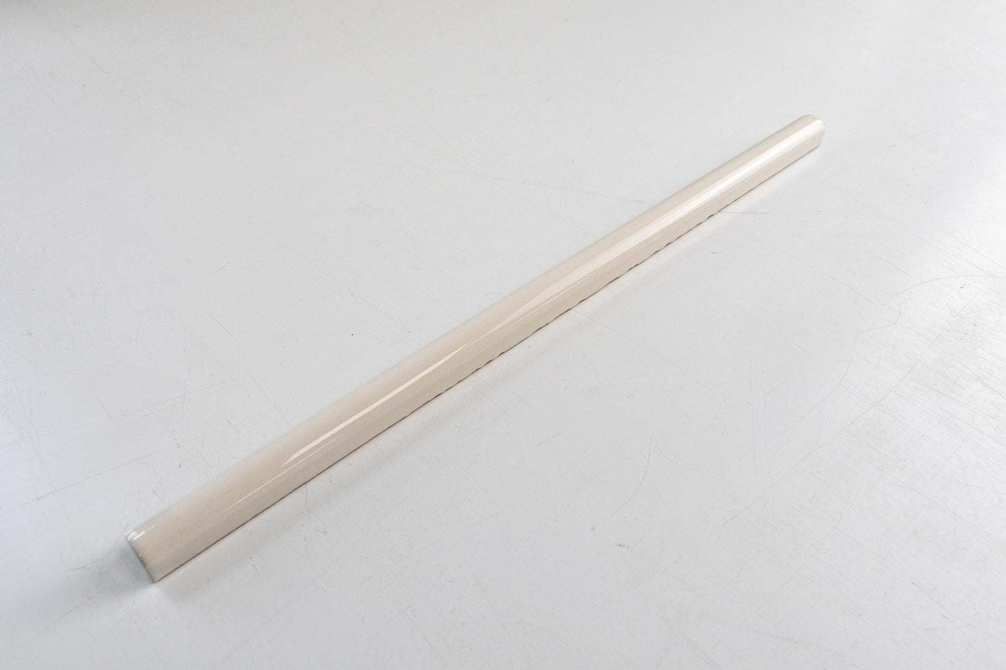 Bridgwood Petite Off White Glossy Liner 0.5" x 12"